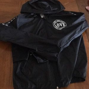 Love wind breaker never worn